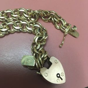 Solid 14kt gold heavy charm bracelet w/heart charm